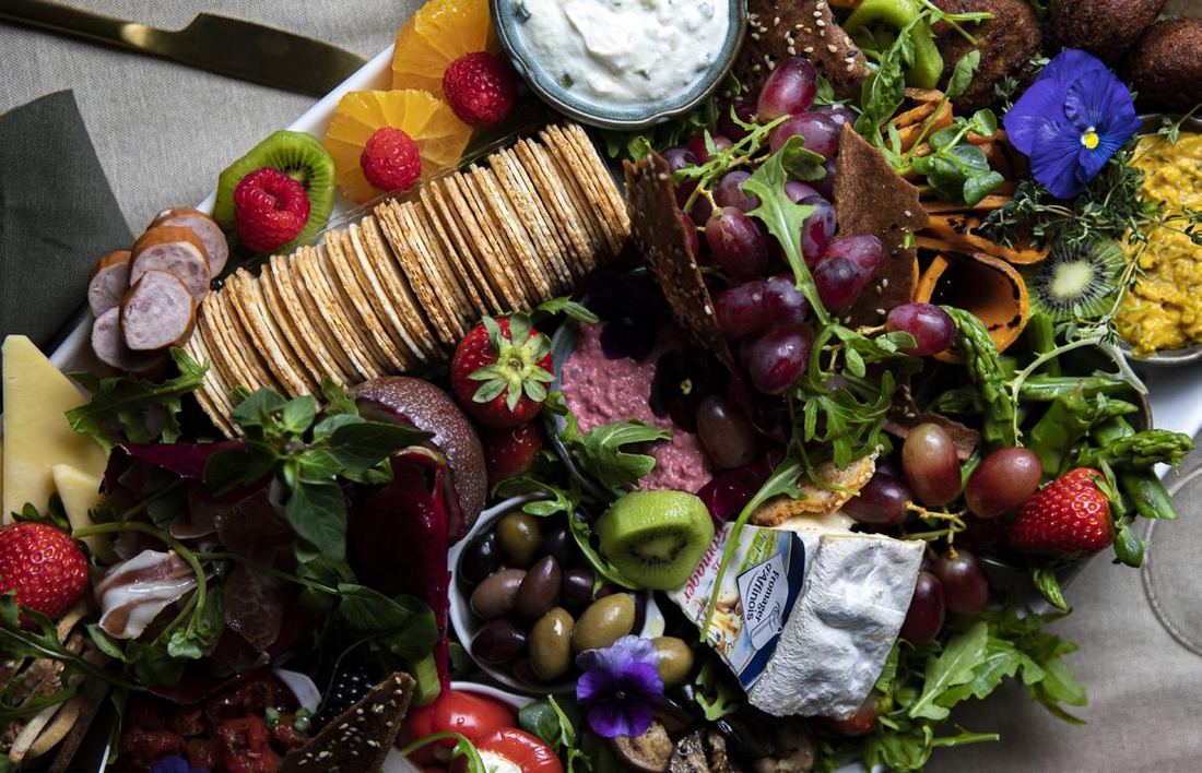 Chatham fruit and cheese platter with crackers, dips and fresh produce
